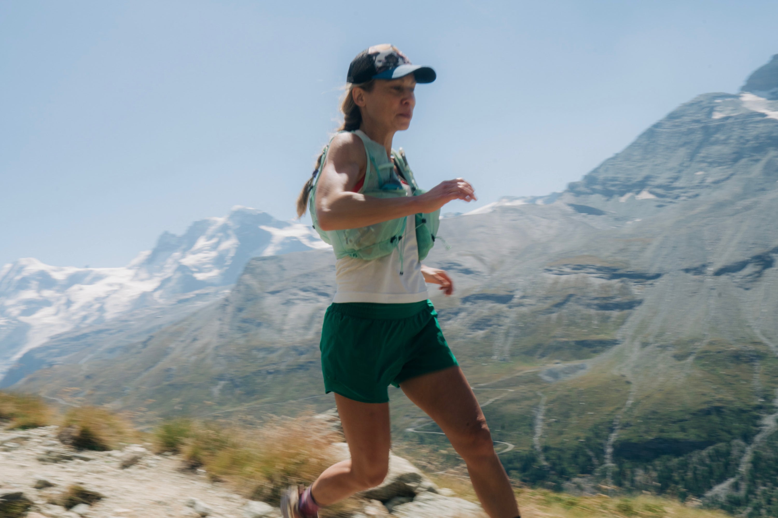 Superhero Muffins founder Elyse Kopecky running on a mountain trail
