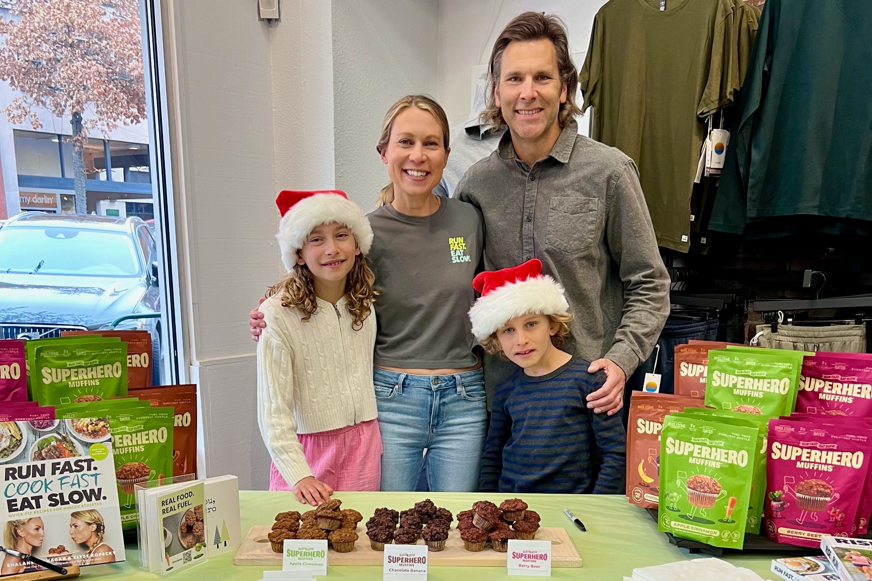 Superhero Muffins founder Elyse Kopecky with her family at Footzone in Bend, OR sampling muffins for a holiday event